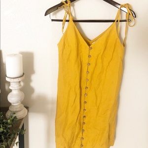 Super cute yellow button dress